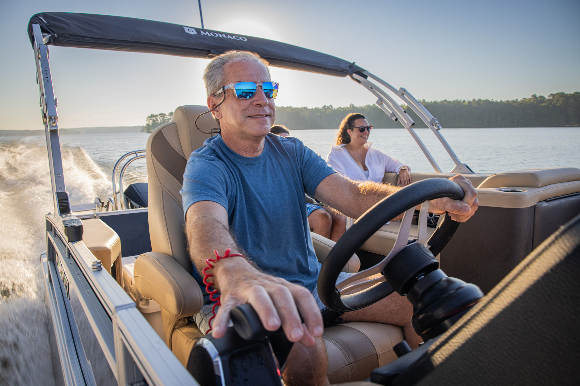 Happy customer driving Rented Pontoon